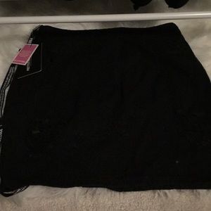 NWT distressed black denim skirt